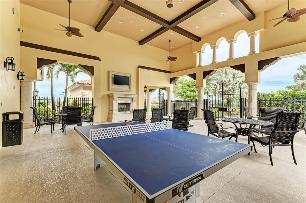 Covered Loggia with Fireplace & Sports Center with TV