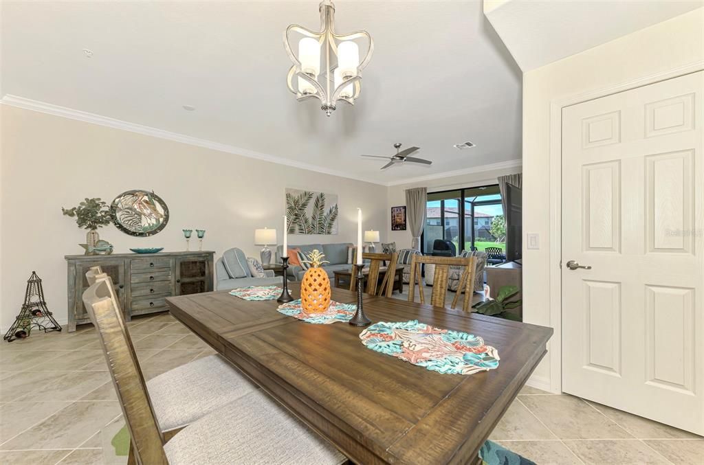 Dining Room with Living Room View (Storage Under Stairway)