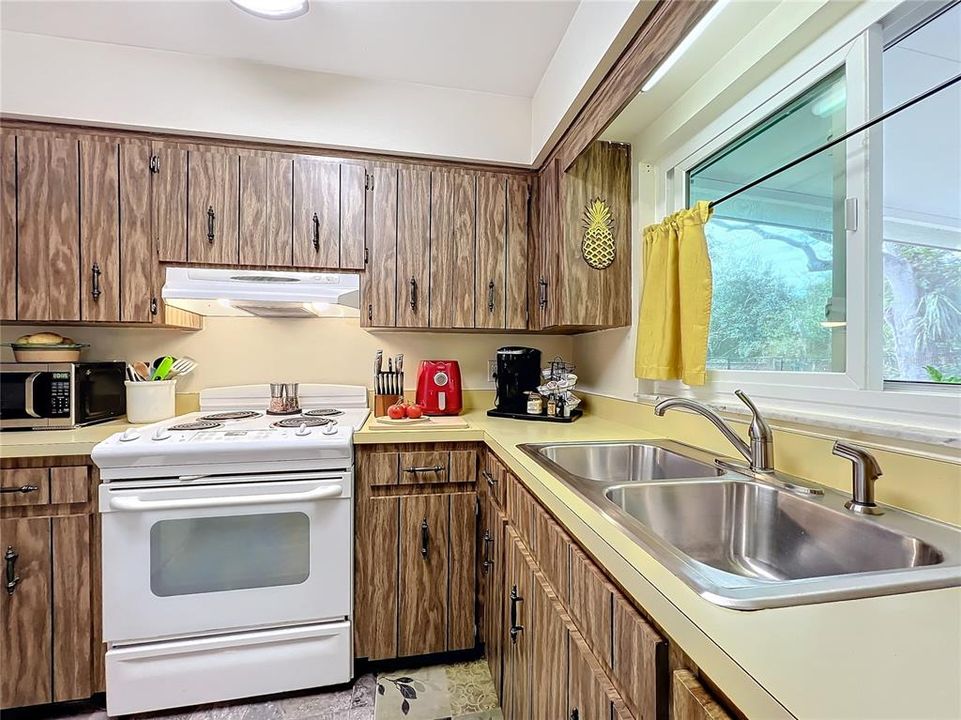 Kitchen with Window facing backyard