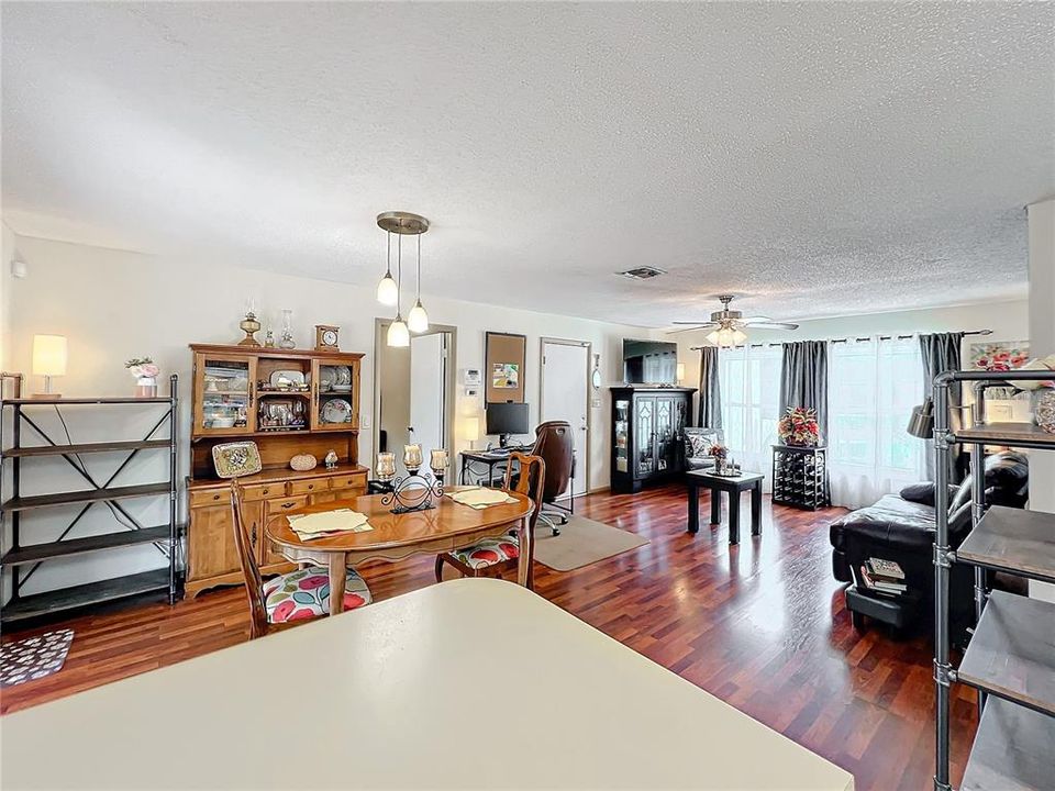 Kitchen View of Dining and Living Room