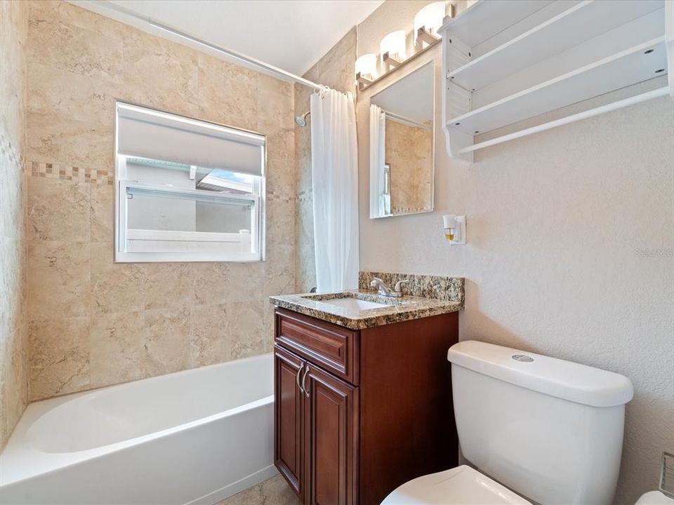 Guest bathroom remodeled with new tub