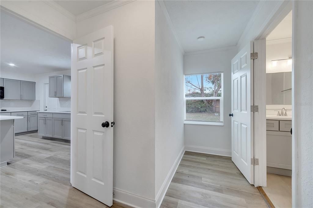 Kitchen to the 2nd Bathroom and enclosed garage