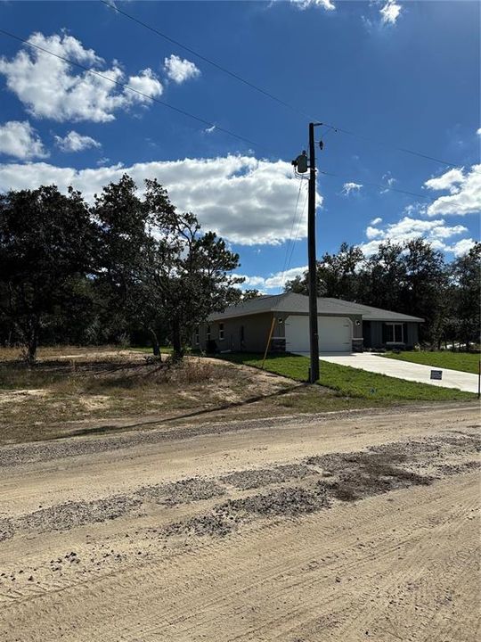 New House to Right of Property