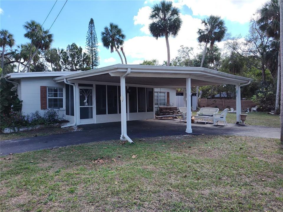 Front of house with circular driveway