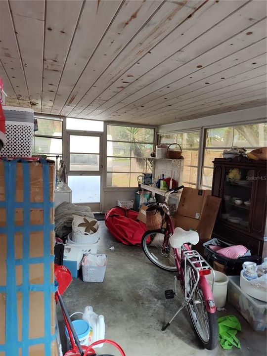 Enclosed porch with laundry room