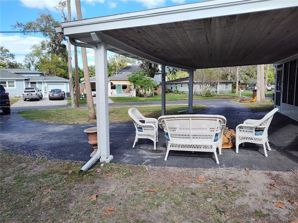 Outdoor covered sitting area.