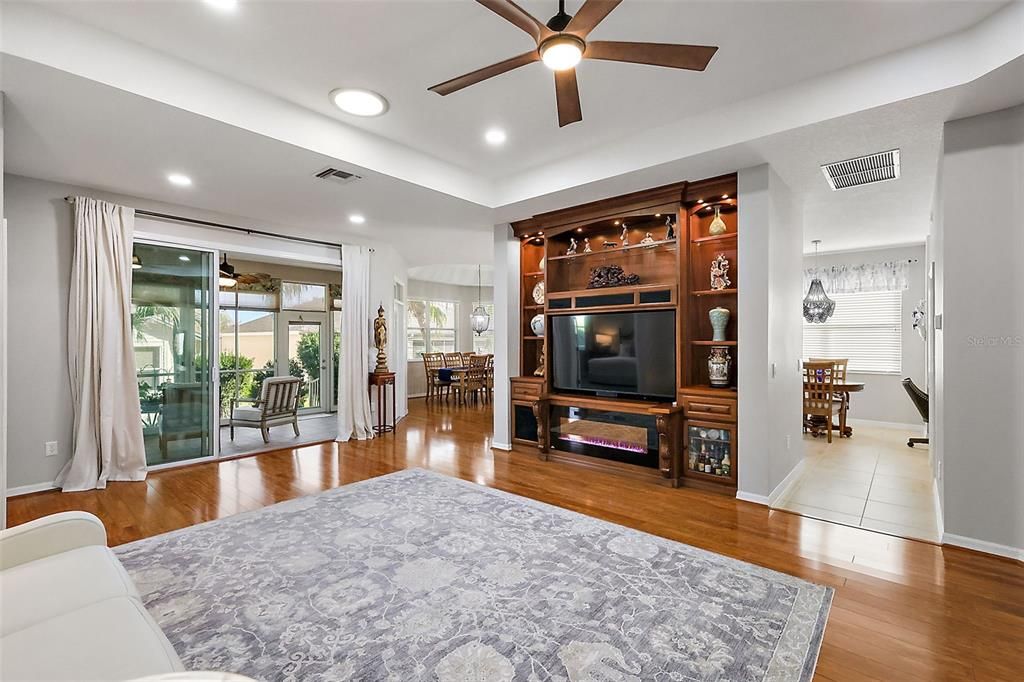 Living room with views to the dining room and kitchen.