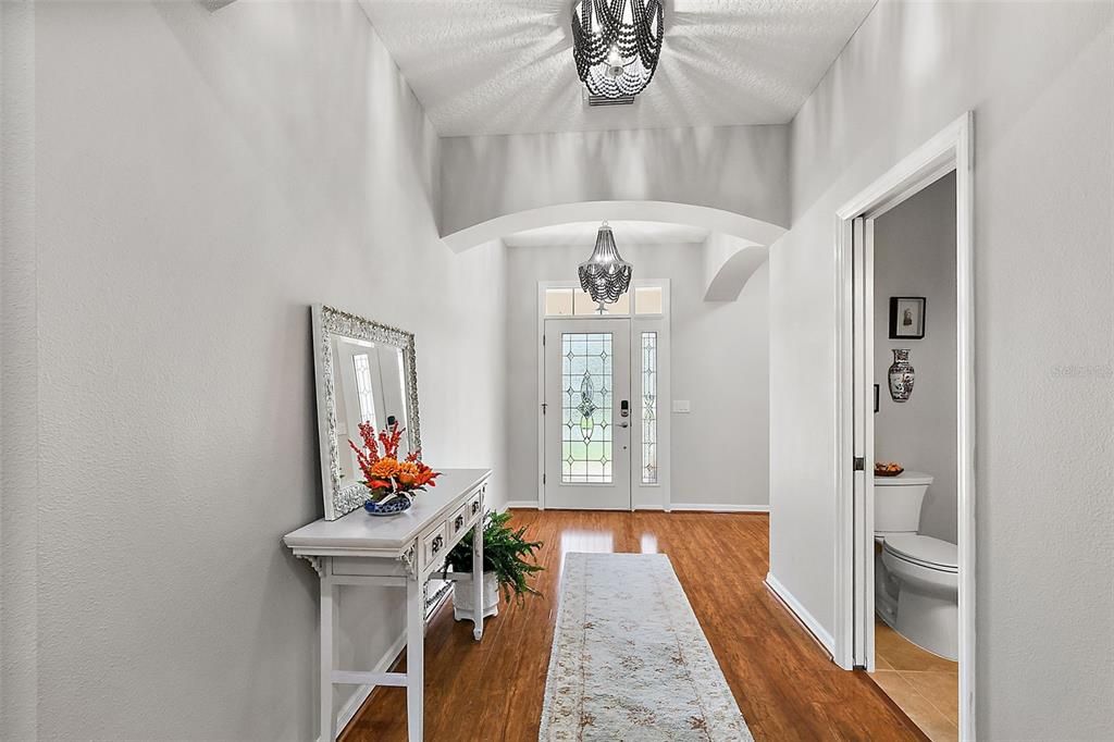 View from the living room, looking to the front door and foyer.