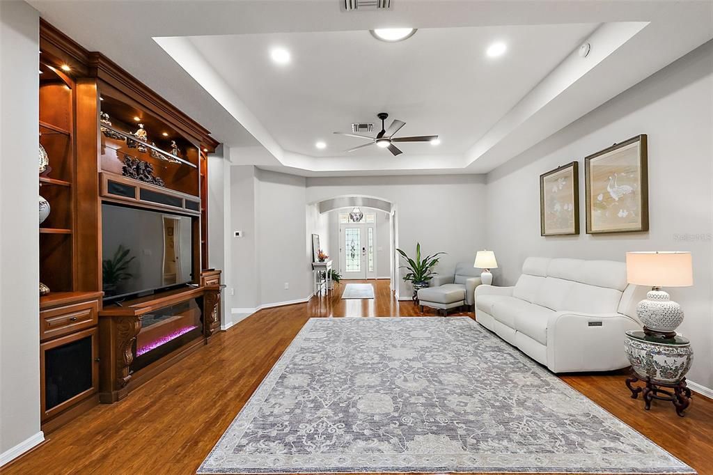 Living room with view to the foyer.