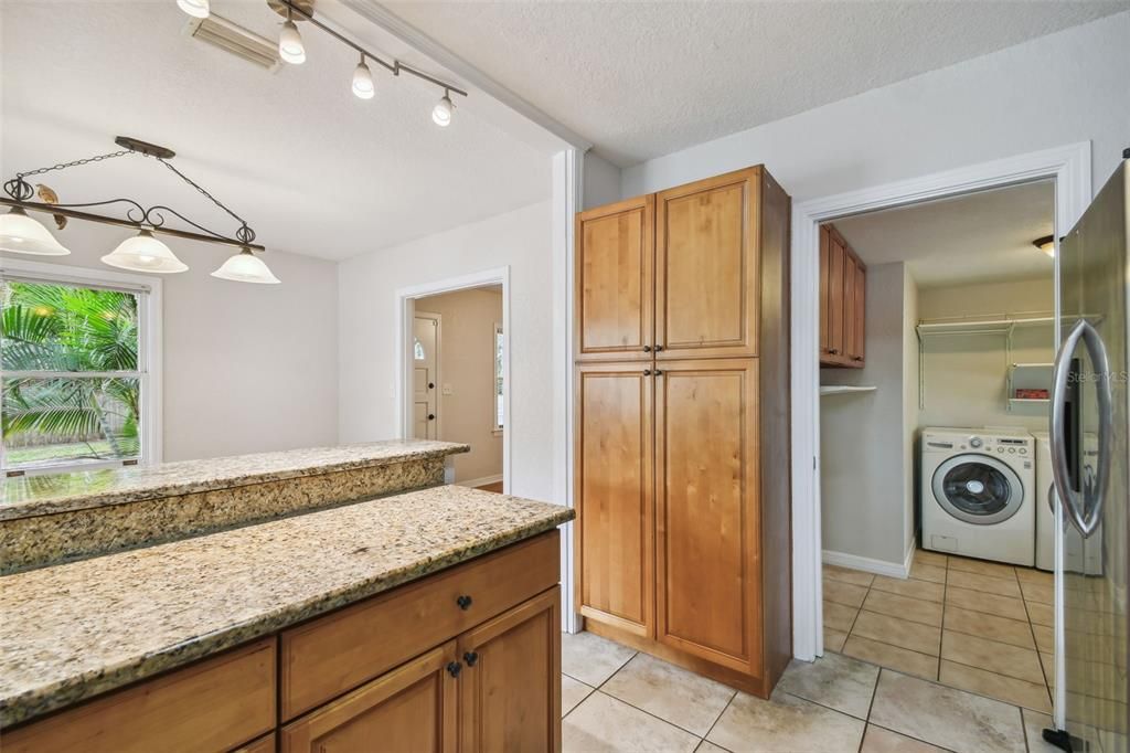 Laundry/mudroom just off the kitchen and leading to the carport