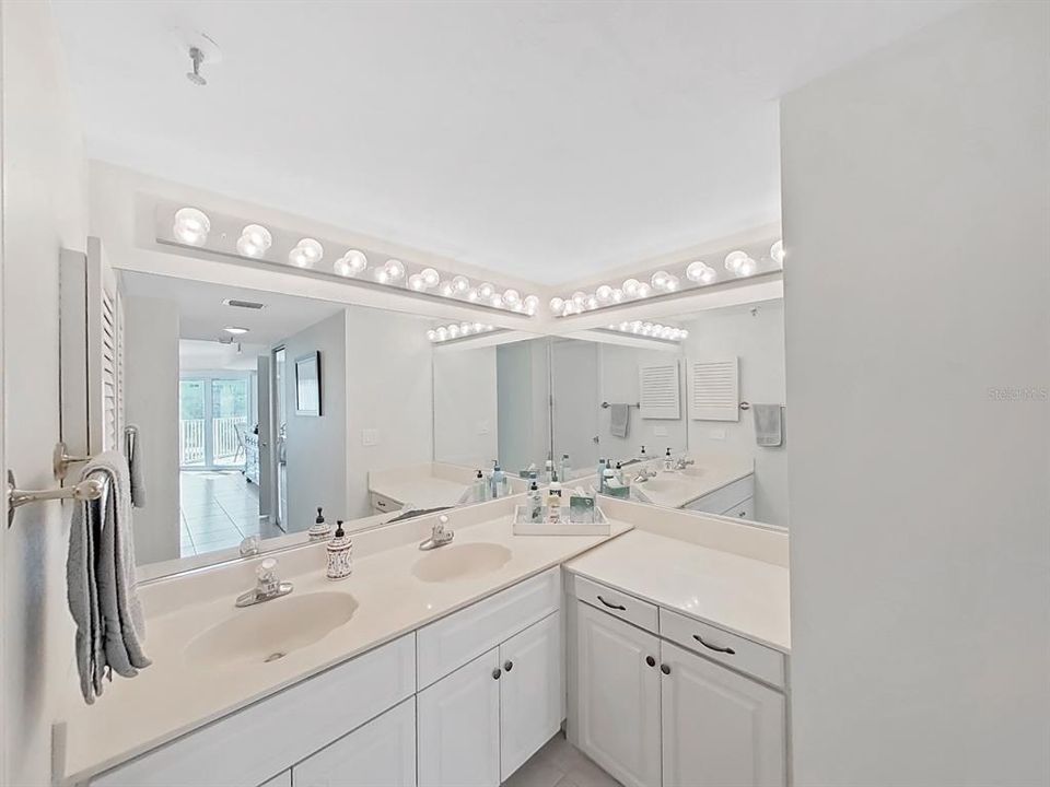 Dual sinks surrounded with mirrors!