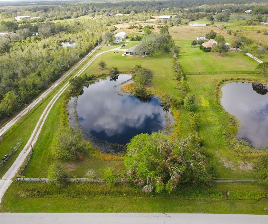 Aerial view of Entrance drive and pond view looking west from Clay Gully Rd