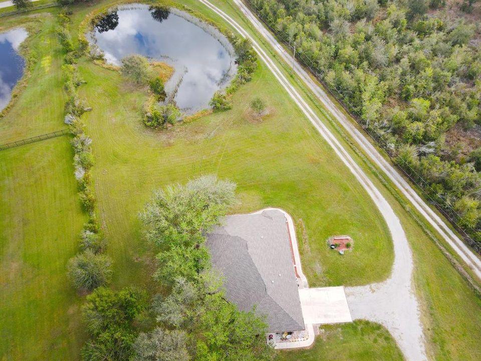 Aerial view showing house and front pond along driveway from Clay Gully Rd