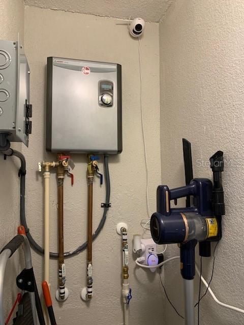 NEW TANKLESS HOT WATER HEATER