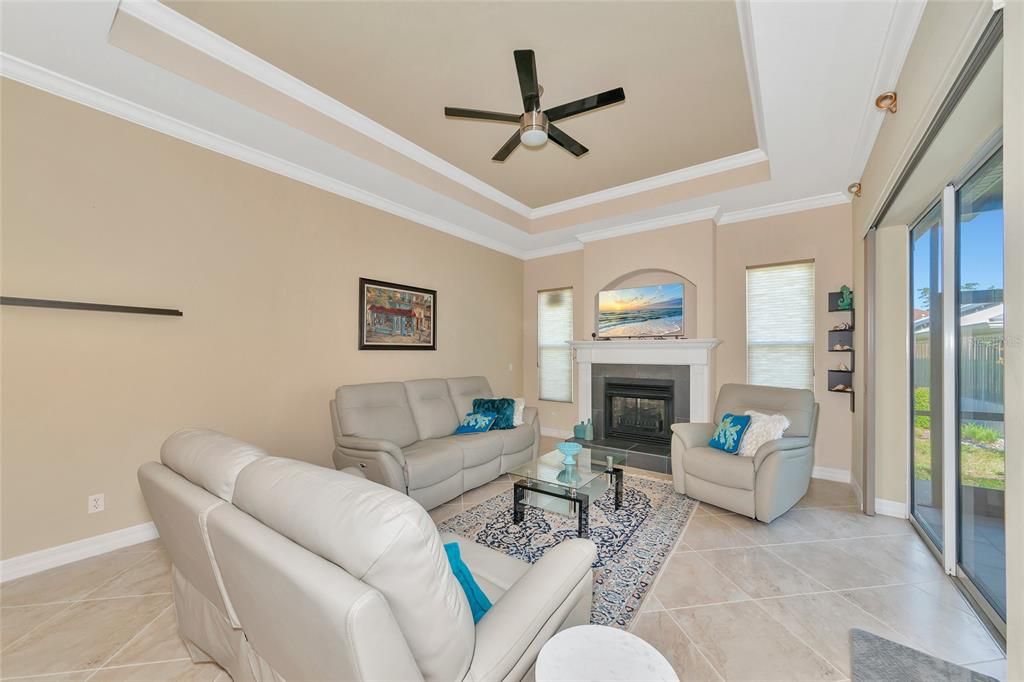 Family room with fireplace and coffered ceiling