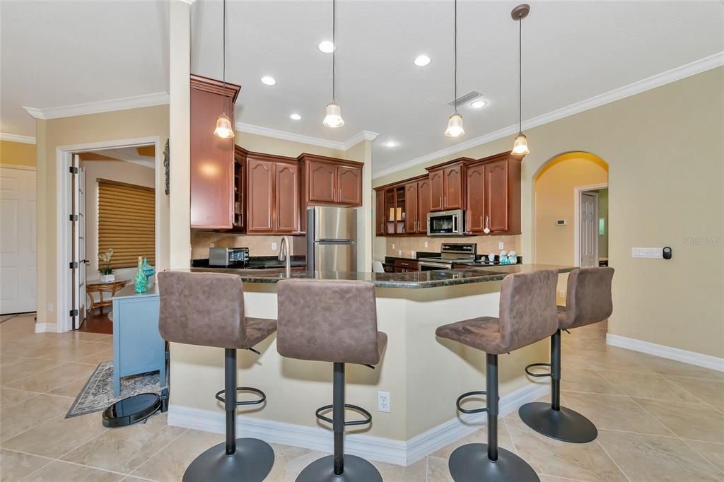 Breakfast bar with granite countertops