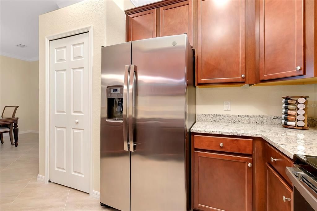 Kitchen with wood cabinets and granite countertops