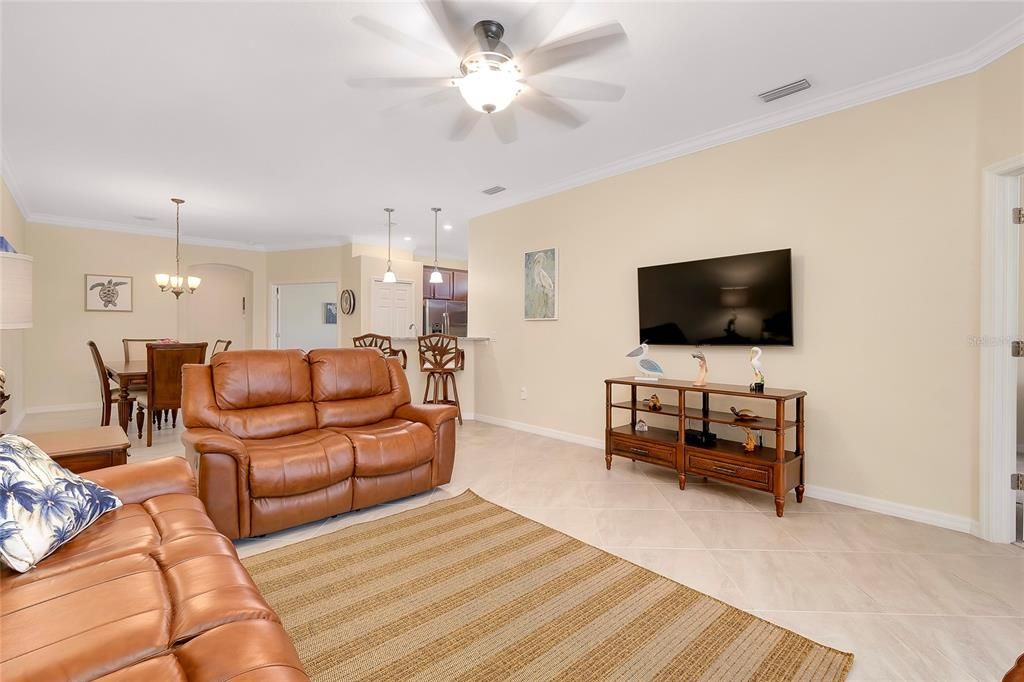 Living room with sliders to enclosed Lanai