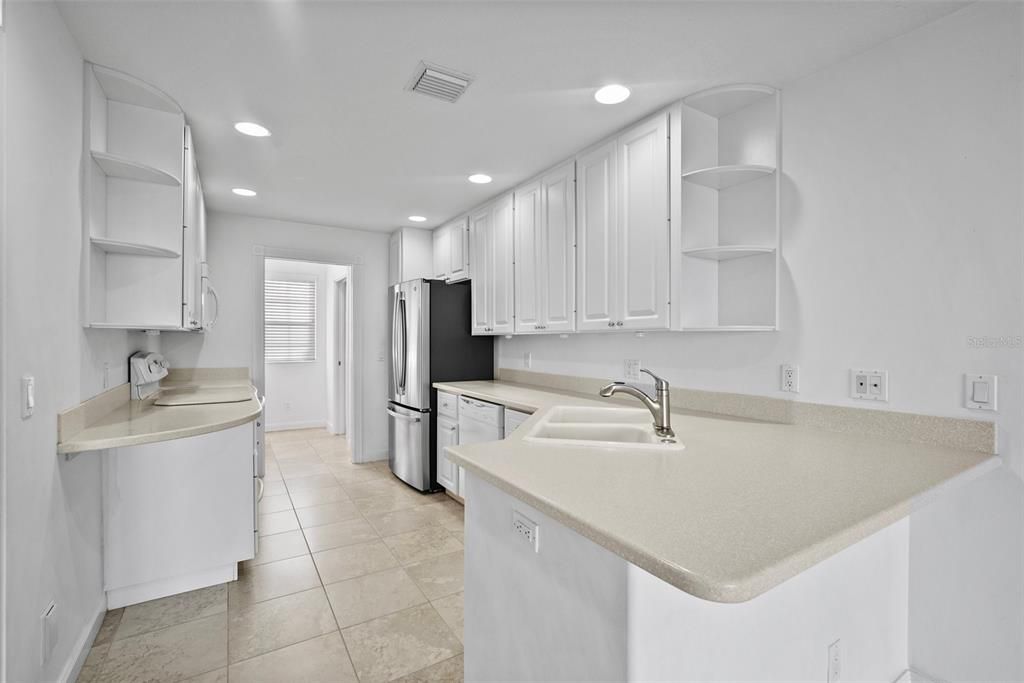 corian countertops and plenty of storage space