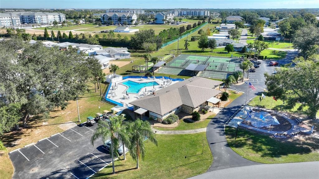 Clubhouse with second pool and tennis courts