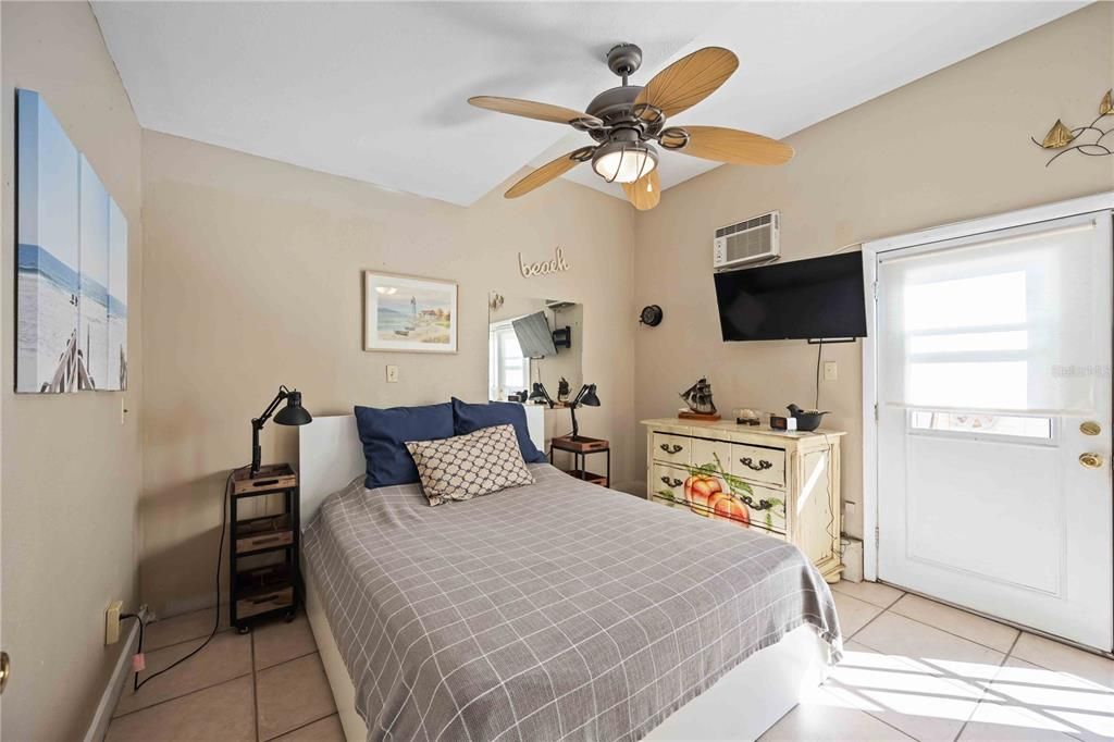 Guest bedroom with ceiling fan.