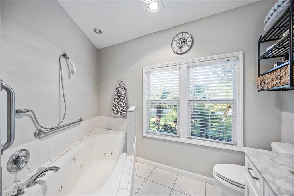 Tub and walk-in shower in the main bathroom