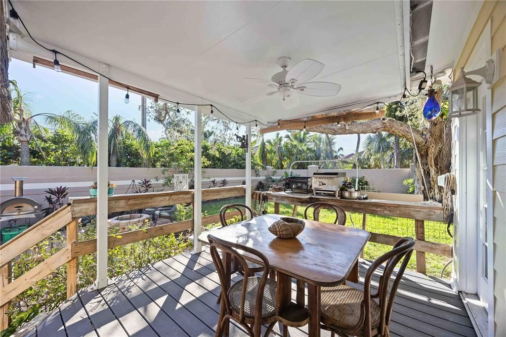 Back porch with a ceiling fan