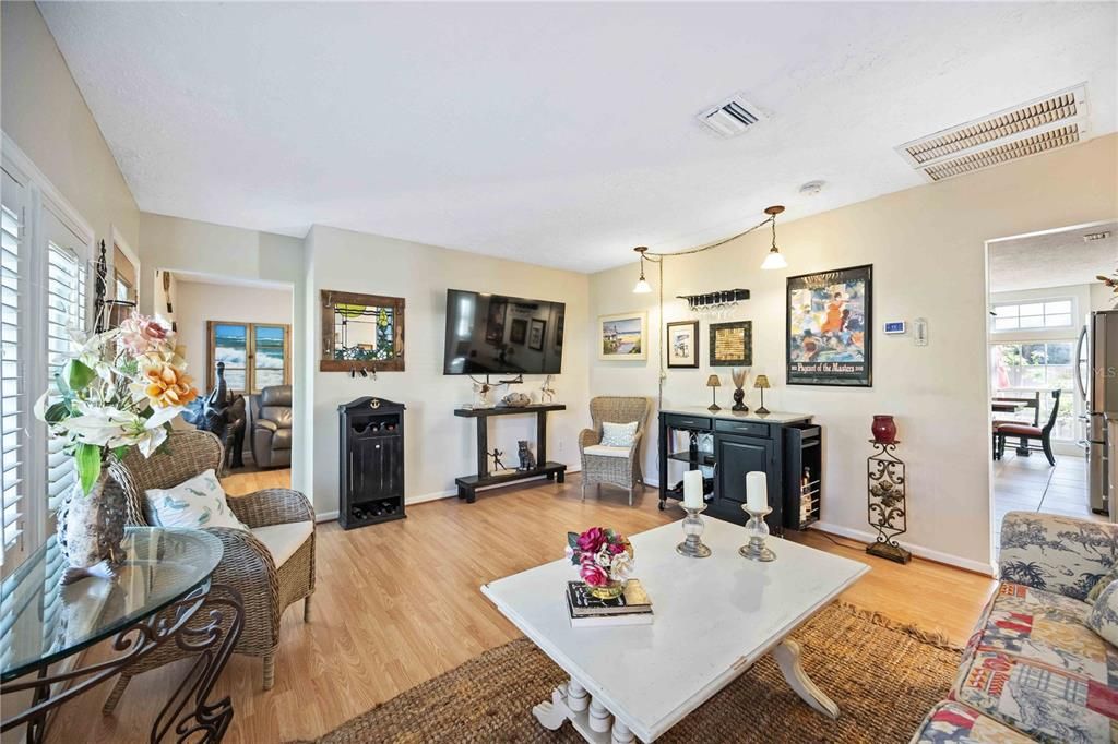 Spacious living room and entrance to the kitchen