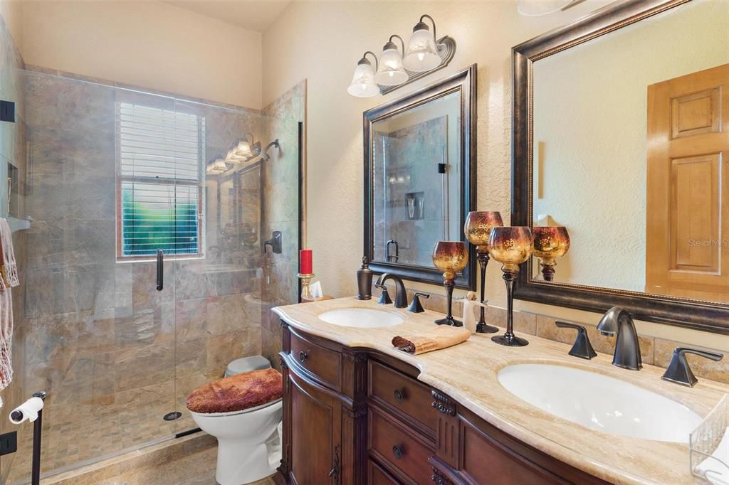 Guest Bathroom with Dual Sinks and Walk-in Shower