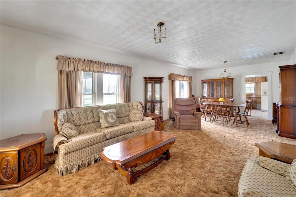 Living/Dining room, wood floor under carpet