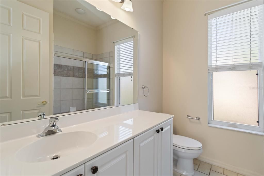 Guest bathroom with a walk-in shower