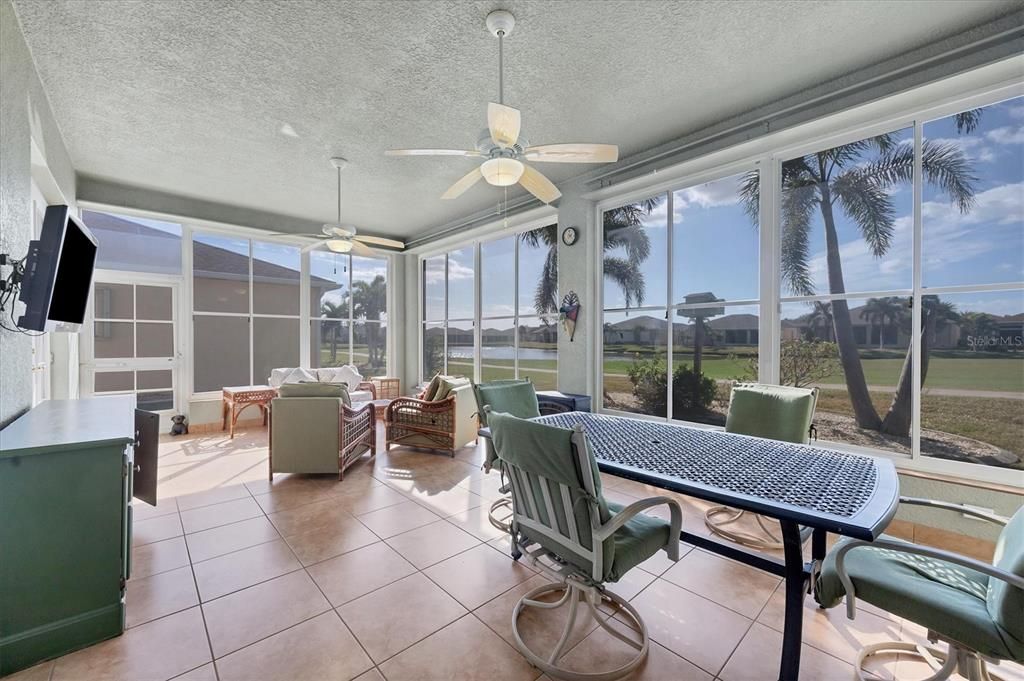 STEPPING THROUGH FRENCH DOORS TO THIS FLORIDA ROOM