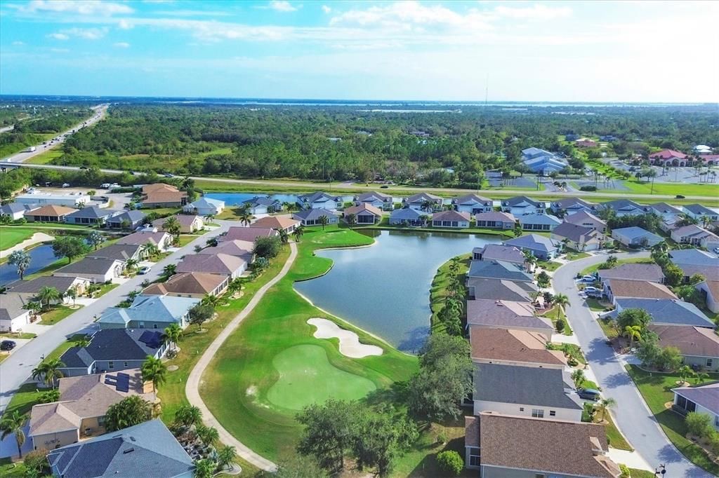 AERIAL OF 15TH GREEN AND WATER