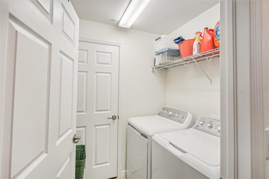 Laundry room inside and washer and dryer stay