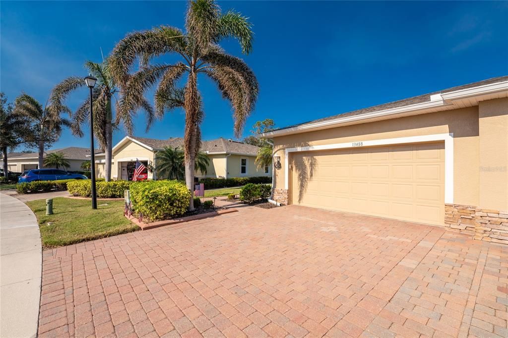 The garage features pull down stairs for storage in the attic and an automatic garage door.