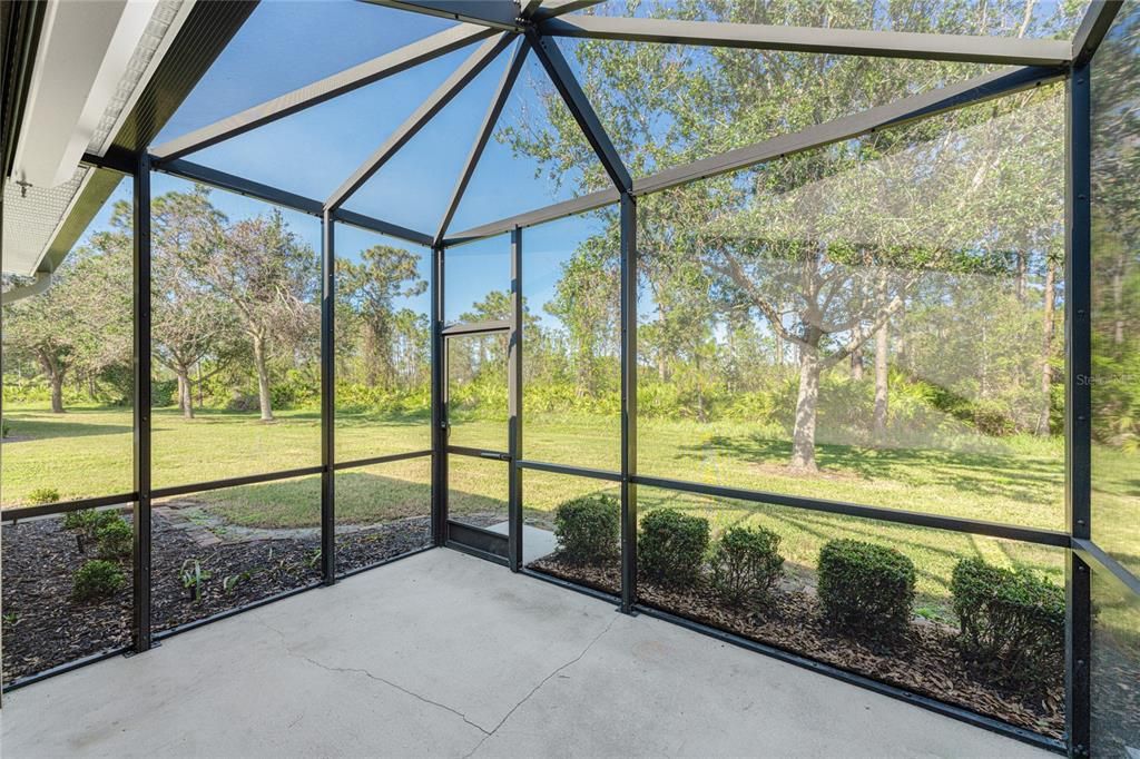 An additional 8 x 14 screened area and concrete flooring was added for more outside living space!