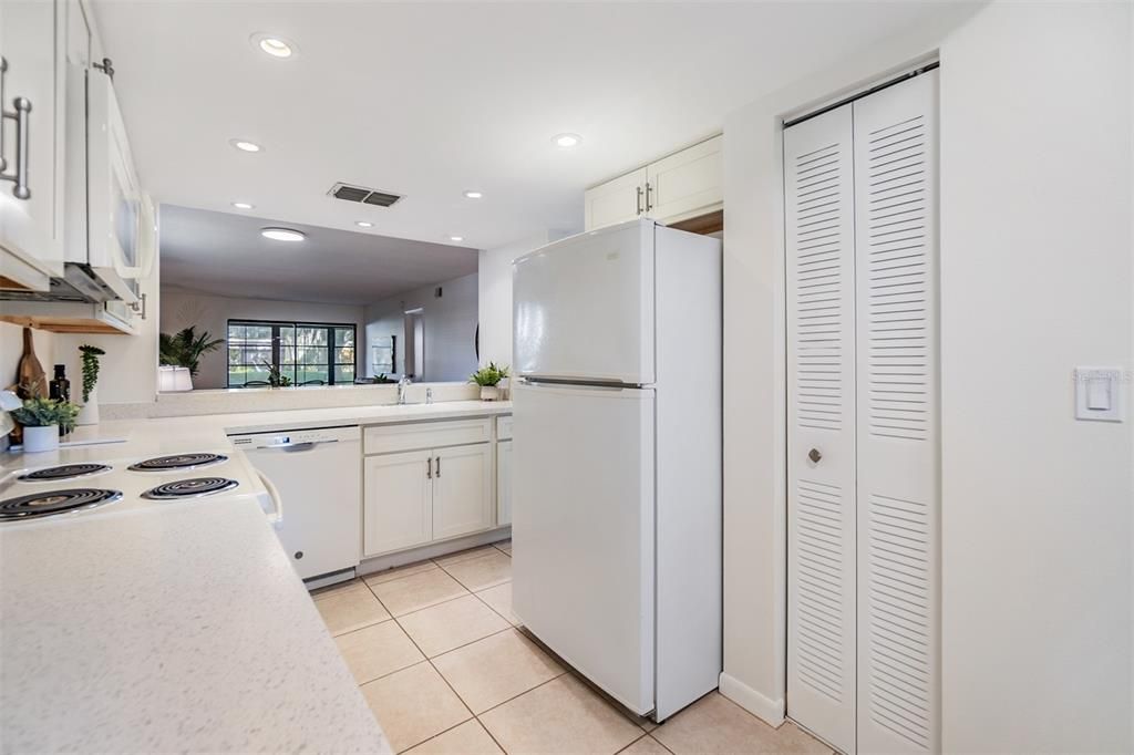 kitchen with soft close cabinetry, kitchen nook & pantry