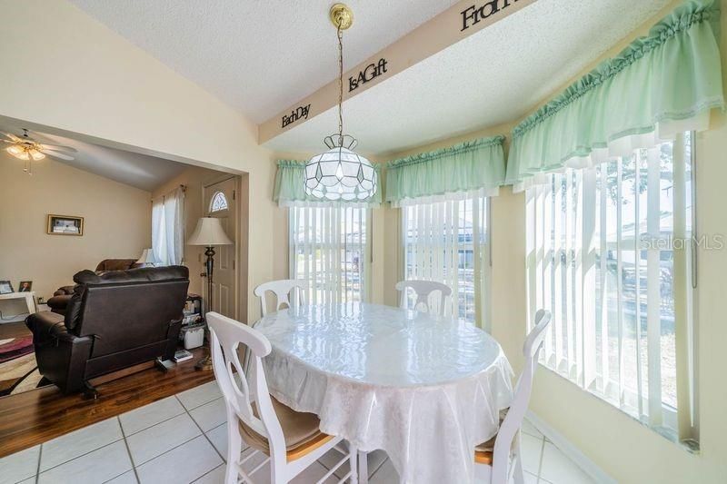 Dinette and view of family room