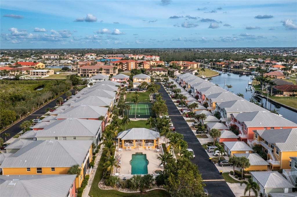 Clubhouse cabana, heated pool and tennis courts await!