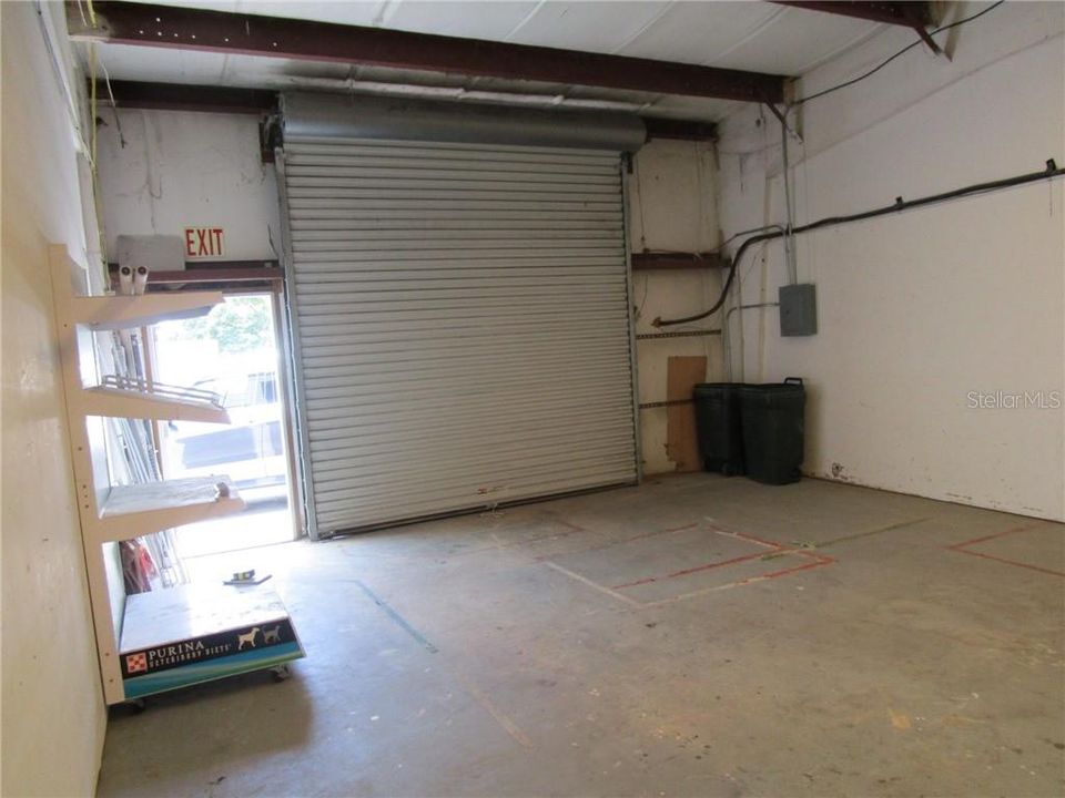 Warehouse with walk through and roll up door