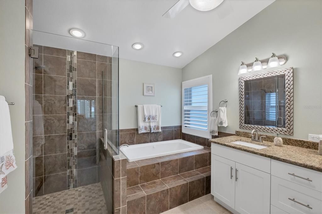 Primary bathroom - walk-in shower and soaking tub with jets