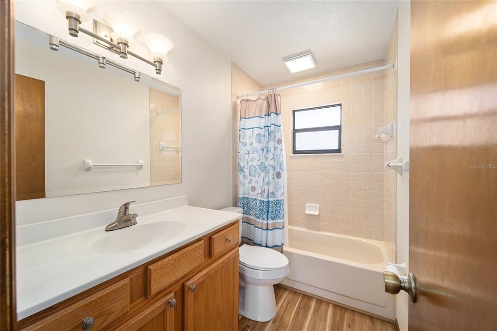 Full bath with shower-tub combination