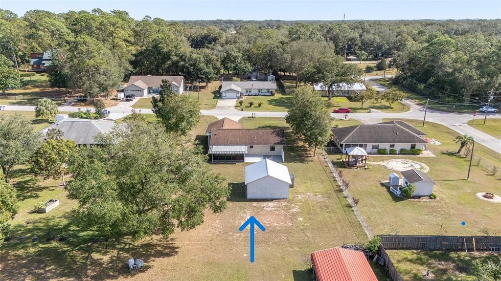 Drone view of the back of the residence