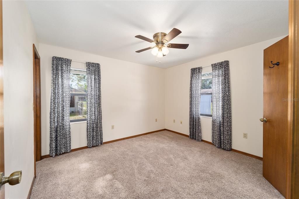 Primary bedroom boasts a walk-in closet and en-suite bath