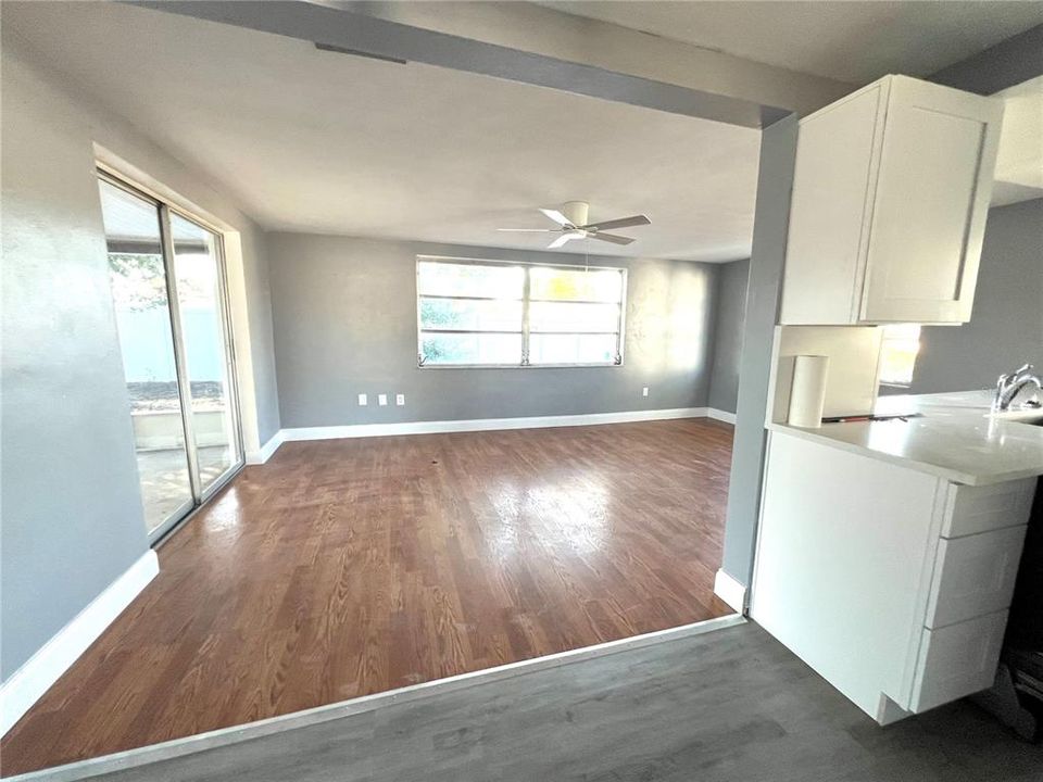 FAMILY ROOM AND KITCHEN VIEW FROM DINING AREA