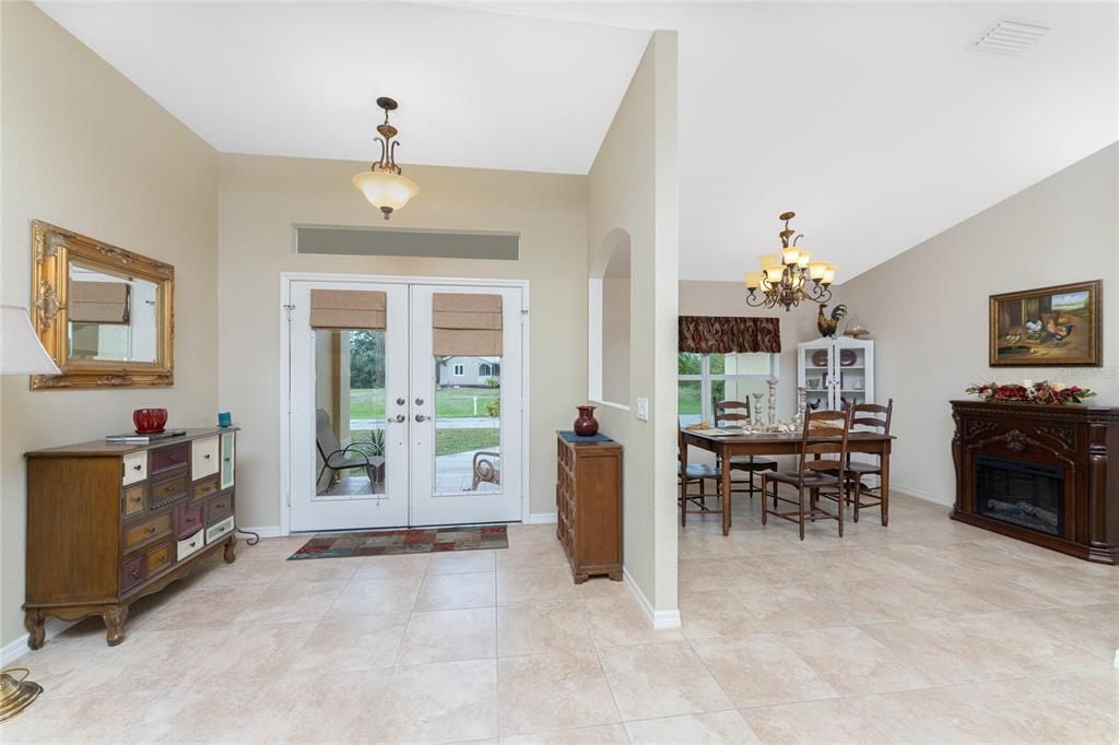 View of front entry and dining room from the living area.