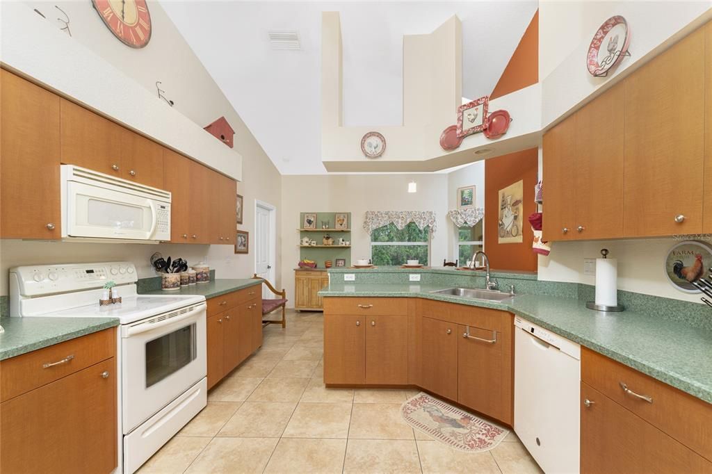 Kitchen features a Frigidaire smooth top stove and microwave along with a GE dishwasher.