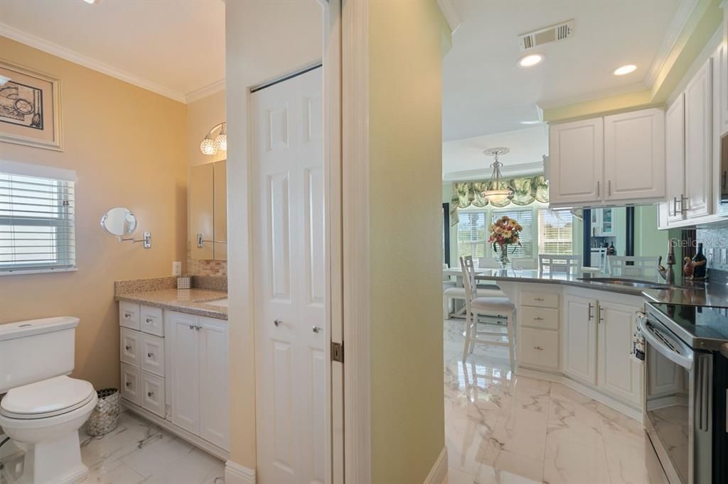 primary bathroom and linen/storage closet