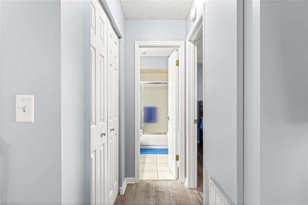 hallway to guest bedroom and bath