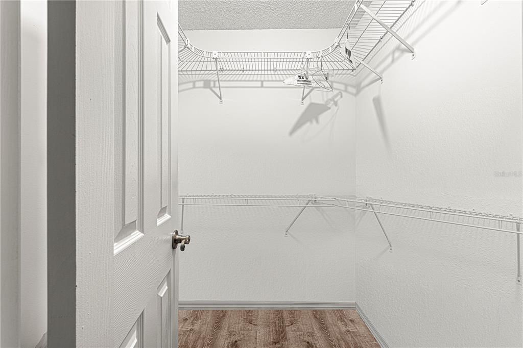 walk in closet in master bedroom